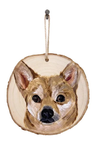 Tan dog painted on a wood slice