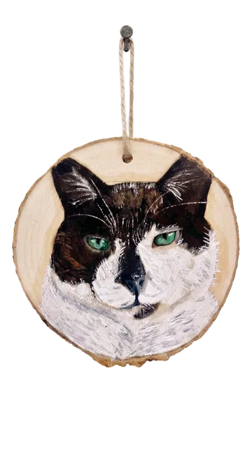 Tuxedo cat painted on a wood slice